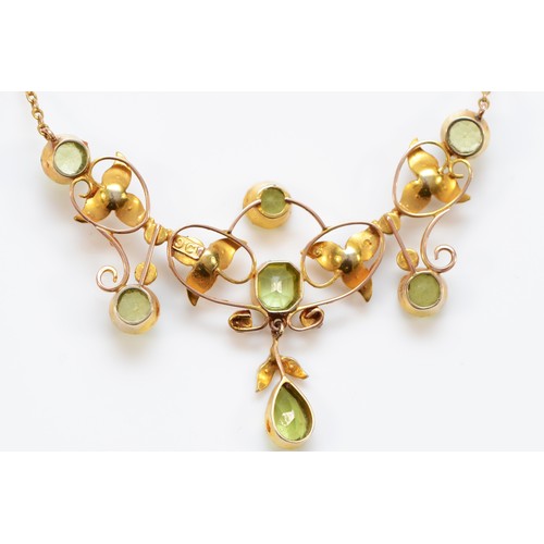 166 - An Edwardian 9ct gold peridot and half pearl necklace, milligrain collet set stones, 50 x 38mm, back... 