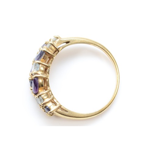 191 - A 9ct gold amethyst, iolite and blue topaz half eternity ring, P, 3.2g