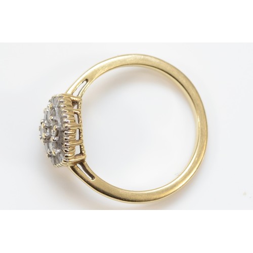 200 - A 9ct gold brilliant and baguette diamond cluster ring, N 1/2, 2.5gm