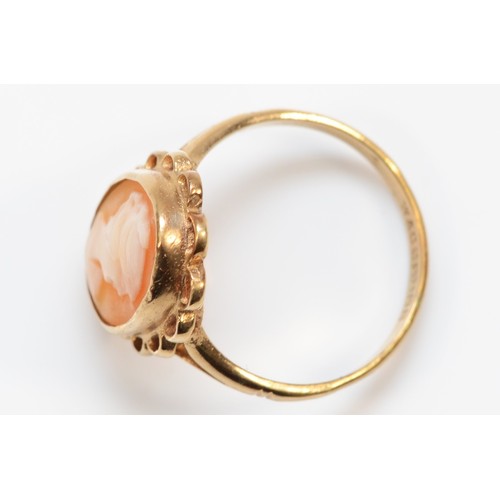 201 - A 9ct gold and shell cameo dress ring, shall 14 x 10mm, P, 2.8gm