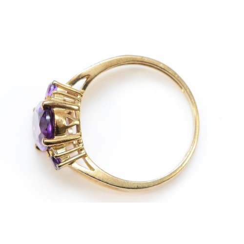 204 - A 9cdt gold amethyst and brilliant cut diamond dress ring, R, 3.1gm