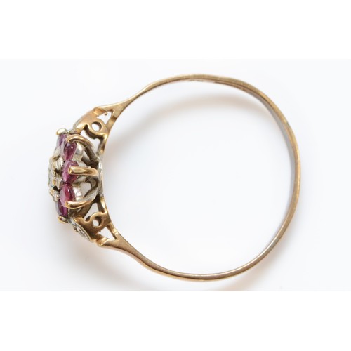 229 - A 9ct gold ruby and diamond cluster ring, Y, 2.4gm