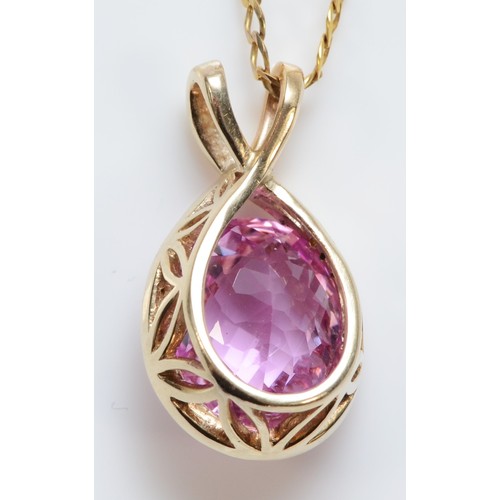 233 - A 9ct gold and facetted pink gemstone pendant, 19mm, chain, 4.2gm