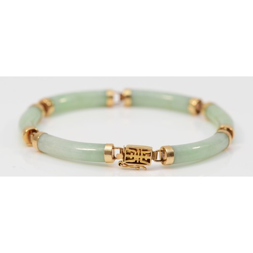 244 - A Chinese 14K gold mounted jadeite panel bracelet, 17.5cm, 12.5gm