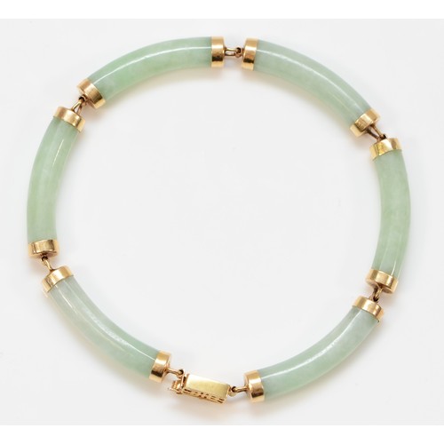 244 - A Chinese 14K gold mounted jadeite panel bracelet, 17.5cm, 12.5gm