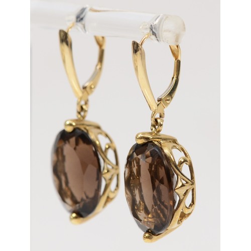 258 - A 9ct gold pair of smokey quartz ear pendants, stones 15 x 11mm, 6.8gm