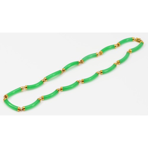 259 - A Chinese 14K mounted enhanced jadeite panel link necklace, 43cm, 23gm