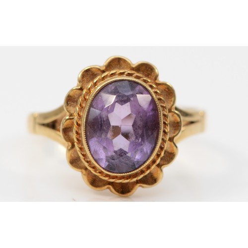 268 - A 9ct gold and amethyst dress ring, P, 3.7gm