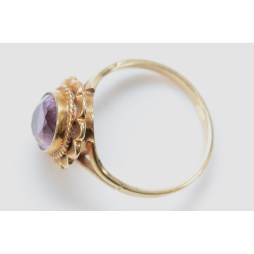 268 - A 9ct gold and amethyst dress ring, P, 3.7gm