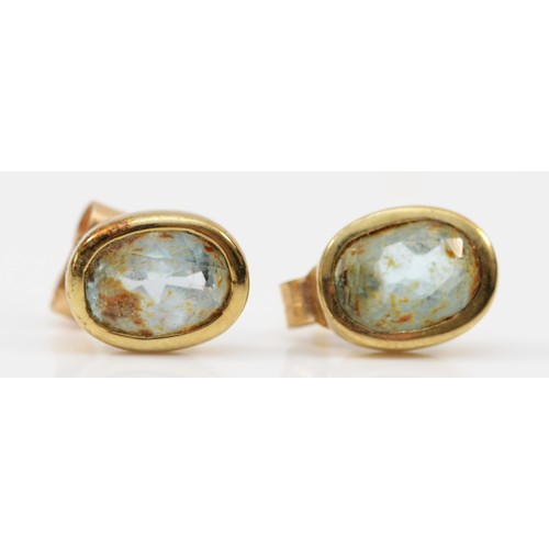 272 - A 9ct gold mounted pair of topaz earstuds, 1.8gm