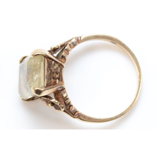 279 - A vintage 9ct gold and citrine dress ring, stone12 x 9mm, O 1/2, 3.9gm