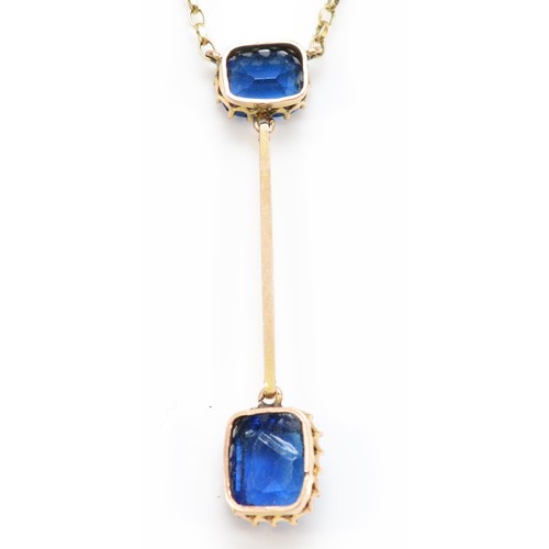 313 - A 9ct gold blue paste pendant, both stones chipped, 41mm, chain, 3.9gm