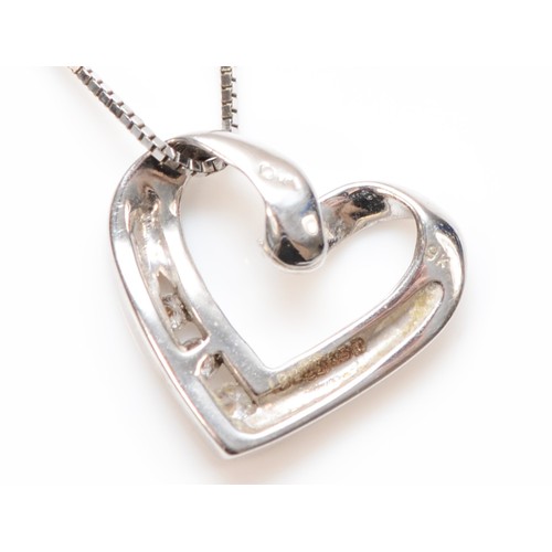 325 - A 9ct white gold diamond openwork heart pendant necklace, pendant is 13mm across, 1.7g