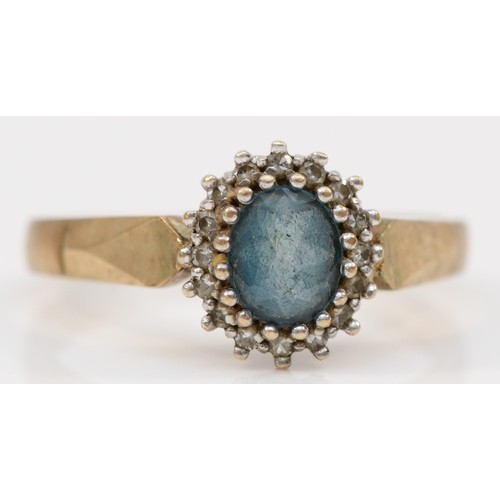 338 - A 9ct gold vintage blue topaz and diamond cluster ring, claw set, O, 3.1g