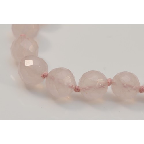 343 - A 9ct gold clasp faceted rose quartz single strand necklace, 69.1g