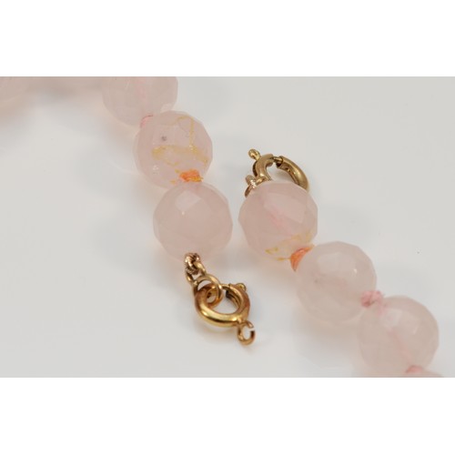 343 - A 9ct gold clasp faceted rose quartz single strand necklace, 69.1g