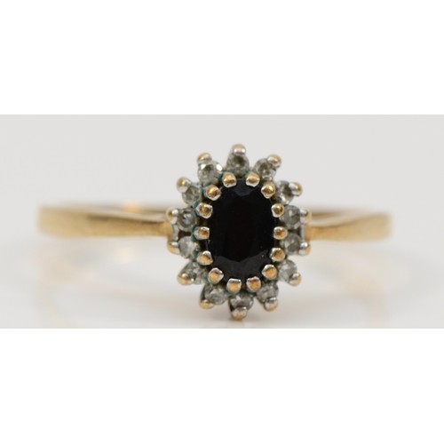 344 - A 9ct gold diamond and sapphire oval cluster ring, R 1/2, 2.4g