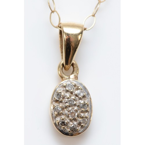 348 - A 9ct gold diamond oval cluster pendant, with necklace, pendant is 13mm, 1g