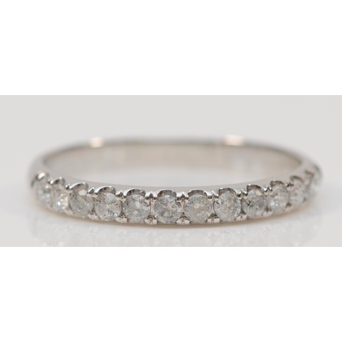 349 - A 9ct white gold diamond half eternity ring, T 1/2, 2.2g