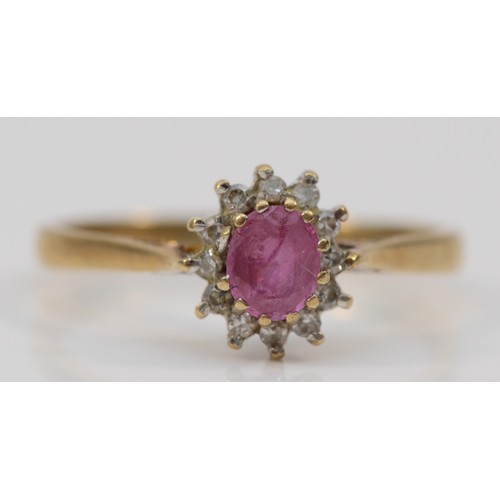 352 - A 9ct gold diamond and pink sapphire oval cluster ring, P 1/2, 1.8g