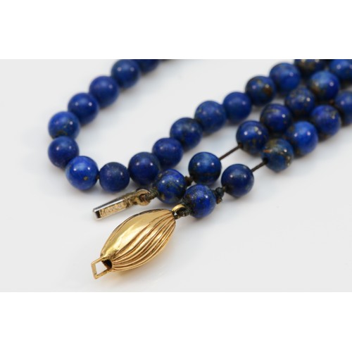 359 - An 18ct gold clasp lapis lazuli single strand necklace, 39.8g