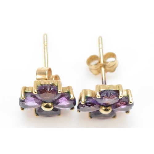 362 - A pair of 9ct gold heart shaped amethyst cluster stud earrings, claw set, 1.4g