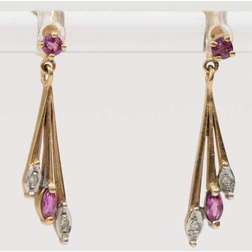 363 - A pair of 9ct gold ruby and diamond drop earrings with scroll backs, 25mm drop, 1.3g