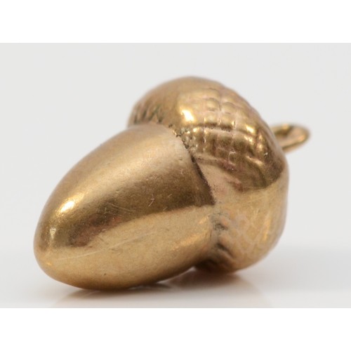 5 - A 9ct gold antique charm in the shape of an acorn, 15mm, 1g