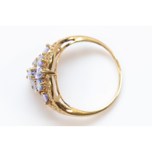 8 - A 9ct gold oval cut tanzanite dress ring, claw set, P 1/2, 2.5g