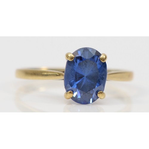 12 - A 9ct gold oval cut sapphire dress ring, claw set, M, 2g