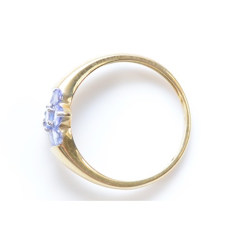 14 - A 9ct gold tanzanite floral cluster ring, claw set, O, 1.7g