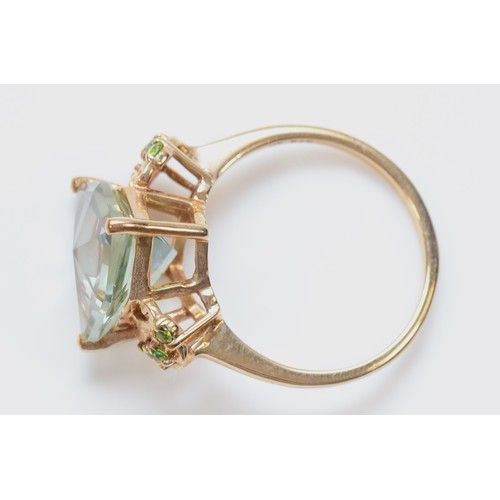 22 - A 9ct gold fancy cut blue and green gemstone dress ring, claw set, N 1/2, 3.5g