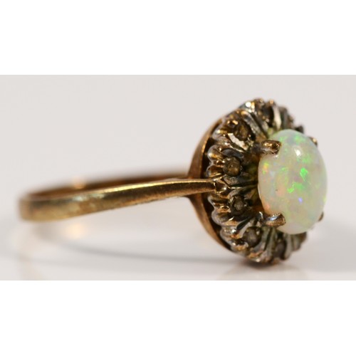 23 - A 9ct gold vintage opal and diamond dress ring, N, 2.1g