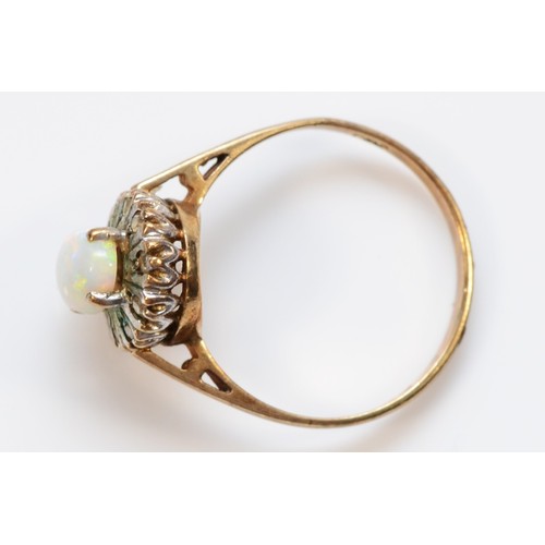 23 - A 9ct gold vintage opal and diamond dress ring, N, 2.1g