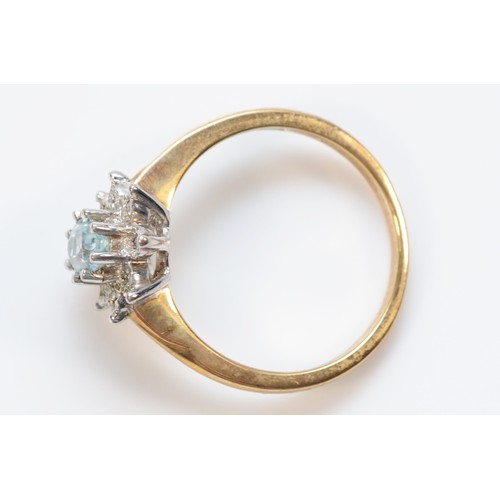 26 - A 9ct gold blue topaz and diamond dress ring, N, 3g