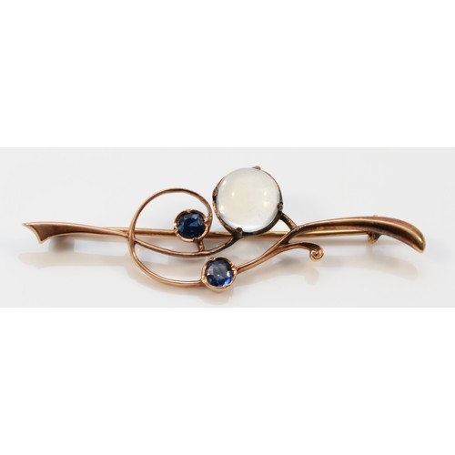 27 - A 9ct gold moonstone and sapphire brooch, 50mm across, 2.8g
