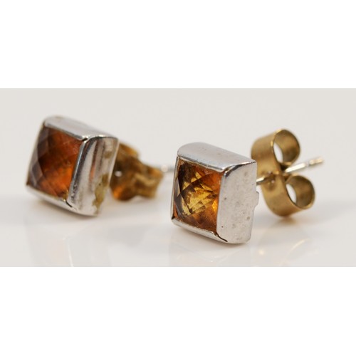 32 - A pair of 9ct gold faceted citrine stud earrings, together with the matching 9ct gold faceted citrin... 