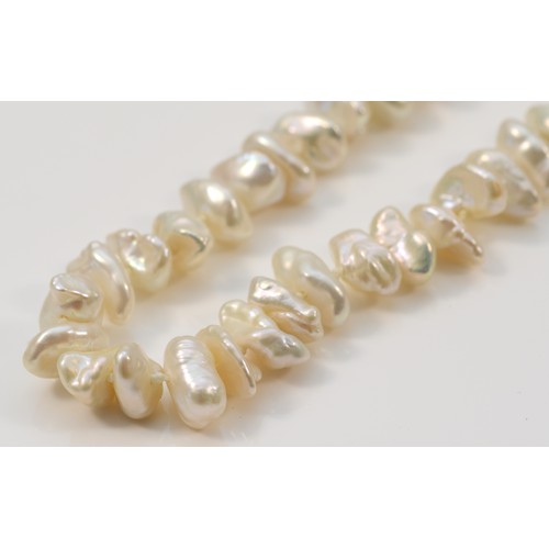 35 - A 9ct gold baroque pearl necklace with matching drop earrings, 36.9g