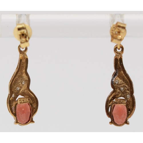 49 - A pair of 9ct gold oval cut garnet and diamond drop earrings with scroll backs, 20mm drop, 1.6g