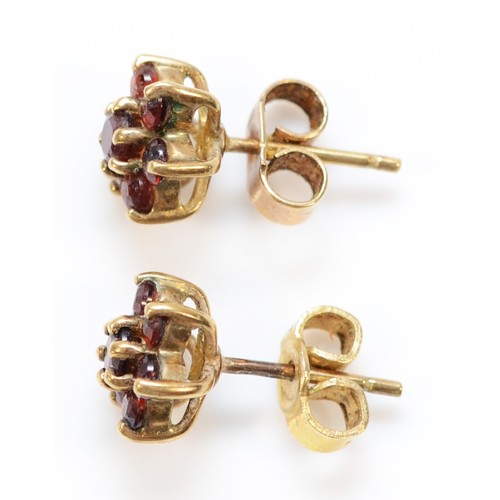 51 - A pair of 9ct gold garnet cluster earrings with scroll backs, 1.4g