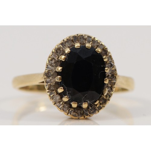 64 - A 9ct gold sapphire and diamond cluster ring, N 1/2, 2.8g