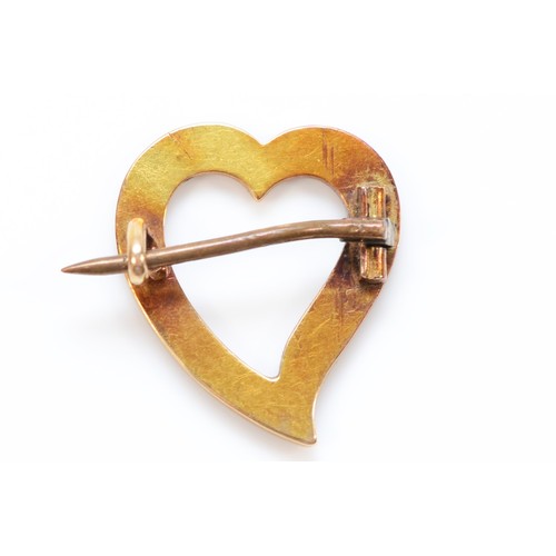 69 - An 18ct gold seed pearl heart shaped brooch, 15mm across, 1.5g