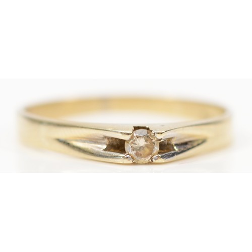 74 - A 14K gold diamond solitaire ring, Q 1/2, 2.2g