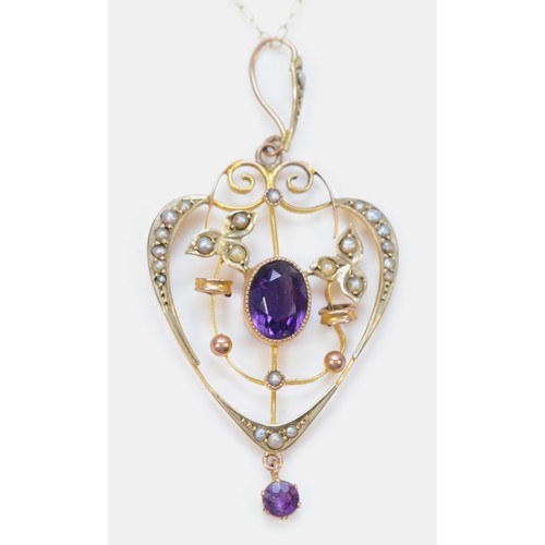 76 - A 9ct gold Edwardian amethyst and seed pearl art nouveau pendant with necklace, 50mm drop, 2.9g