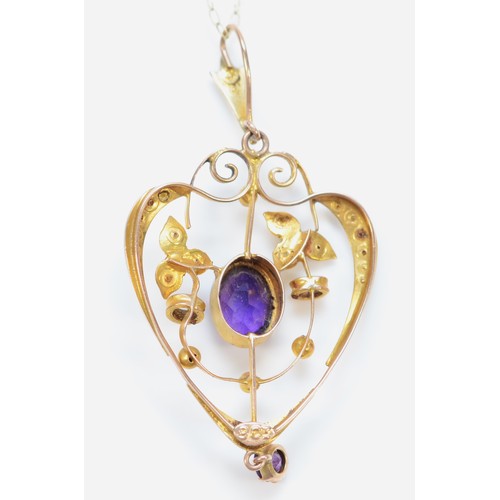 76 - A 9ct gold Edwardian amethyst and seed pearl art nouveau pendant with necklace, 50mm drop, 2.9g