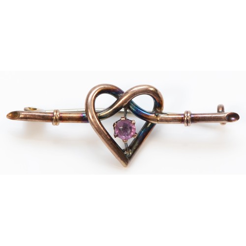 84 - A 9ct gold amethyst heart brooch, 35mm across, 1.2g