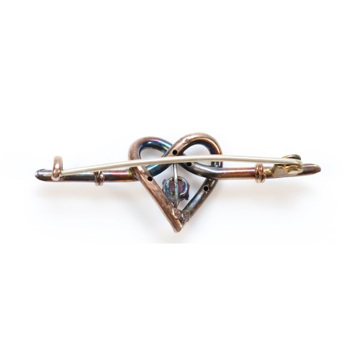 84 - A 9ct gold amethyst heart brooch, 35mm across, 1.2g