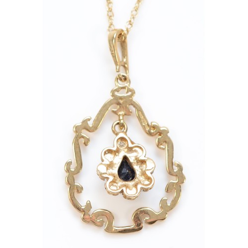 86 - A 9ct gold sapphire and diamond accented teardrop pendant with necklace, 30mm drop, 2.7g