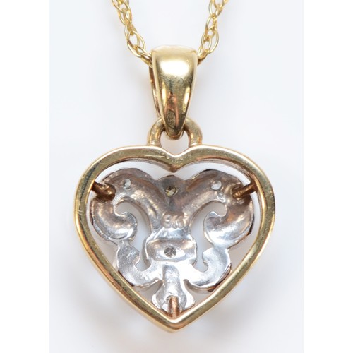 91 - A 9ct gold diamond set heart shaped pendant with necklace, 10mm heart, 2.5g