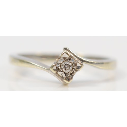 92 - A 9ct white gold illusion set diamond solitaire ring, K, 1.9g